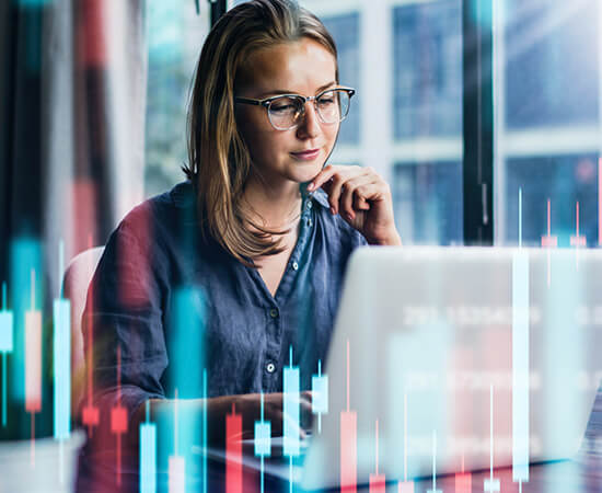 A woman working on a laptop